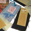 cartellini in tessuto con cucitura con cartellino in garza e cartellino garanzia in carta